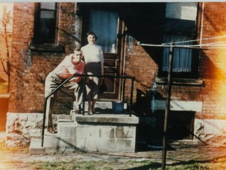 old picture mom and dad outside apt