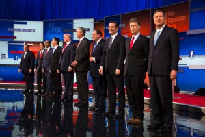 Republican presidential candidates from left, Chris Christie, Marco Rubio, Ben Carson, Scott Walker, Donald Trump, Jeb Bush, Mike Huckabee, Ted Cruz, Rand Paul, and John Kasich take the stage for the first Republican presidential debate at the Quicken Loans Arena Thursday, Aug. 6, 2015, in Cleveland. (AP Photo/John Minchillo) ORG XMIT: OHJM122